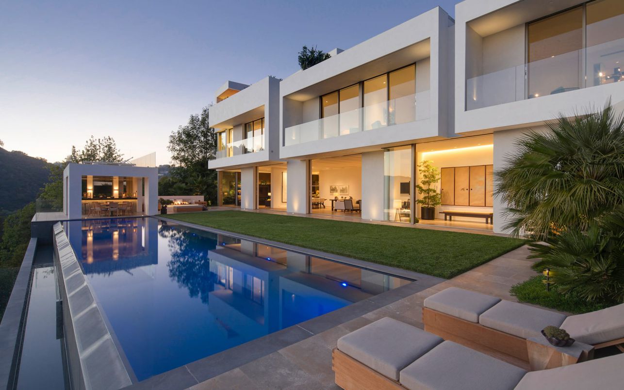 ...FAIA, An over 11,000 square feet modern mansion epitomizing the Los Ange...