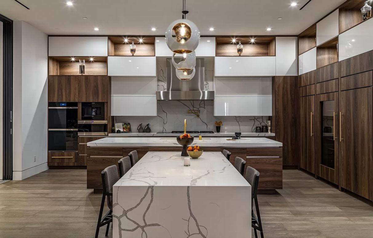 Add depth and tactile interest to your splashback with textured tiles. Whether it's a raised relief pattern, a three-dimensional design, or a rough surface, textured tiles can create a captivating visual and sensory experience in your kitchen. Additionally, they can help conceal any imperfections or stains that may occur over time.