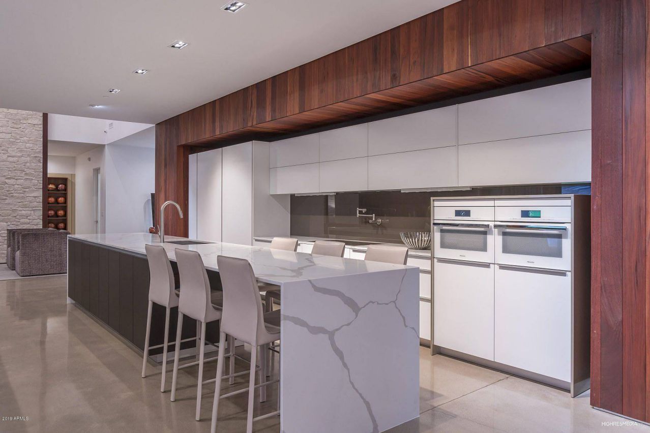 Opt for sleek and minimalist glass panels as your splashback to achieve a streamlined and sophisticated look. Available in various colors and finishes, glass panels provide a seamless and easy-to-clean surface that enhances the overall aesthetic of your kitchen. This also could be a wonderful Luxury idea. 