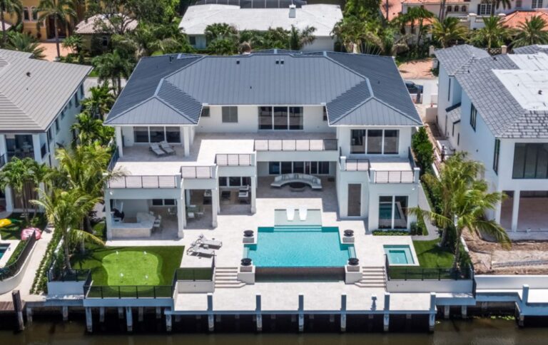 Luxurious Waterfront Estate in Boca Raton’s Exclusive Royal Palm Yacht and Country Club with Custom Contemporary Design and First-Class Amenities