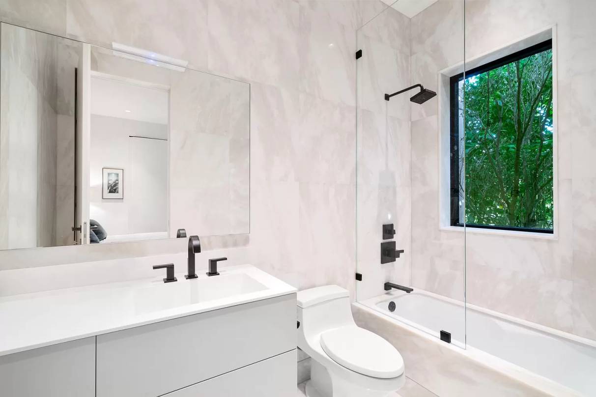 Marble is not only elegant, but also extremely textured. Line your shower walls with elegant white marble to make the entire bathroom more visually appealing.