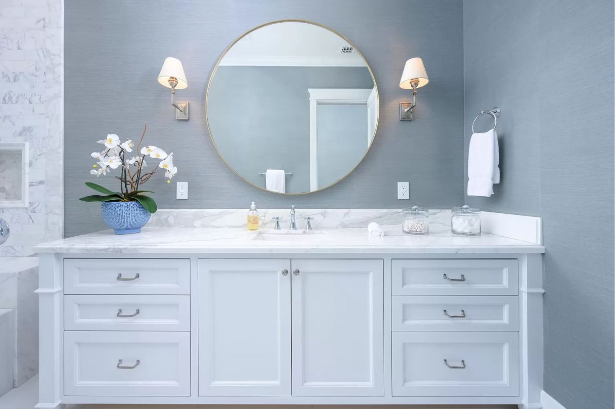 Your bathroom's walls may not be the only thing that needs to be repainted. If your vanity doesn't fit into your clean white palette, grab a paintbrush and start to work. Although the DIY project may need some elbow grease, it is a less expensive option to replacing your vanity.