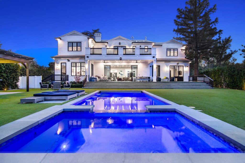 The Home in Tarzana is a spectacular newly constructed gated estate with unveiling panoramic views of majestic mountains now available for sale. This home located at 5074 Casa Dr, Tarzana, California; offering 6 bedrooms and 9 bathrooms with over 8,700 square feet of living spaces.