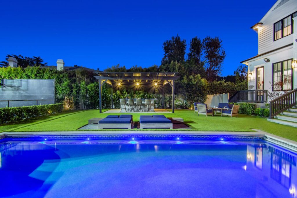 The Home in Tarzana is a spectacular newly constructed gated estate with unveiling panoramic views of majestic mountains now available for sale. This home located at 5074 Casa Dr, Tarzana, California; offering 6 bedrooms and 9 bathrooms with over 8,700 square feet of living spaces.