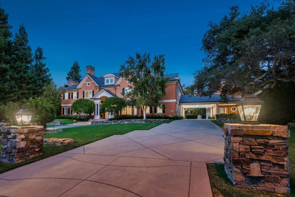 The Hamptons Style House is a Epic custom landmark estate with complete privacy and unobstructed fairway, lakes and mountain views now available for sale. This home located at 224 W Stafford Rd, Thousand Oaks, California; offering 5 bedrooms and 8 bathrooms with over 10,700 square feet of living spaces.