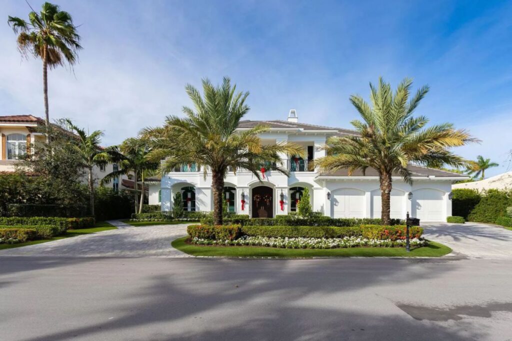 The Home for Sale in Boca Raton is a luxurious home with with specimen palms, is prelude to an up-lit mature tropical landscape, hedged and gated for privacy. This home located at 1717 Sabal Palm Dr, Boca Raton, Florida; offering 5 bedrooms and 9 bathrooms with over 6,800 square feet of living spaces.
