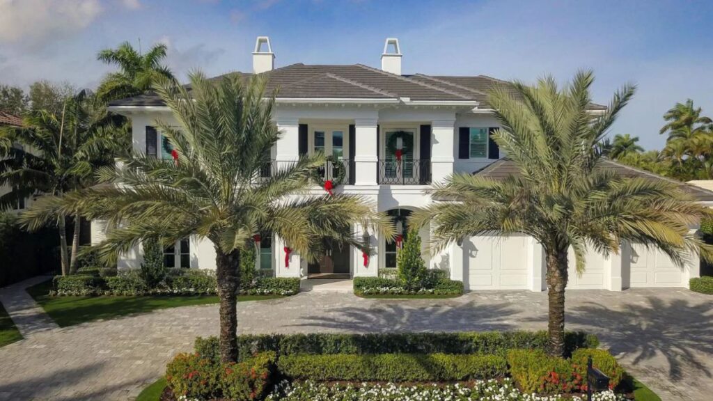 The Home for Sale in Boca Raton is a luxurious home with with specimen palms, is prelude to an up-lit mature tropical landscape, hedged and gated for privacy. This home located at 1717 Sabal Palm Dr, Boca Raton, Florida; offering 5 bedrooms and 9 bathrooms with over 6,800 square feet of living spaces.
