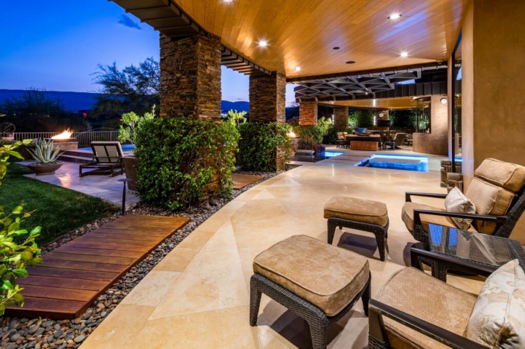 The Home in Las Vegas is a luxurious residence with a mix of natural, rustic materials and sleek contemporary design now available for sale. This home located at 11 Golden Sunray Ln, Las Vegas, Nevada; offering 5 bedrooms and 7 bathrooms with over 9,700 square feet of living spaces.