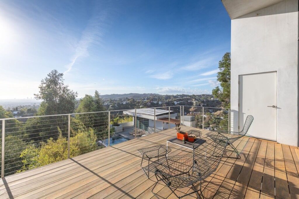 The Los Angeles Home is a gated modern classic estate perched atop the prestigious Oaks enclave of Los Feliz now available for rent. This home located at 2511 Wild Oak Dr, Los Angeles, California; offering 5 bedrooms and 6 bathrooms with over 4,100 square feet of living spaces.