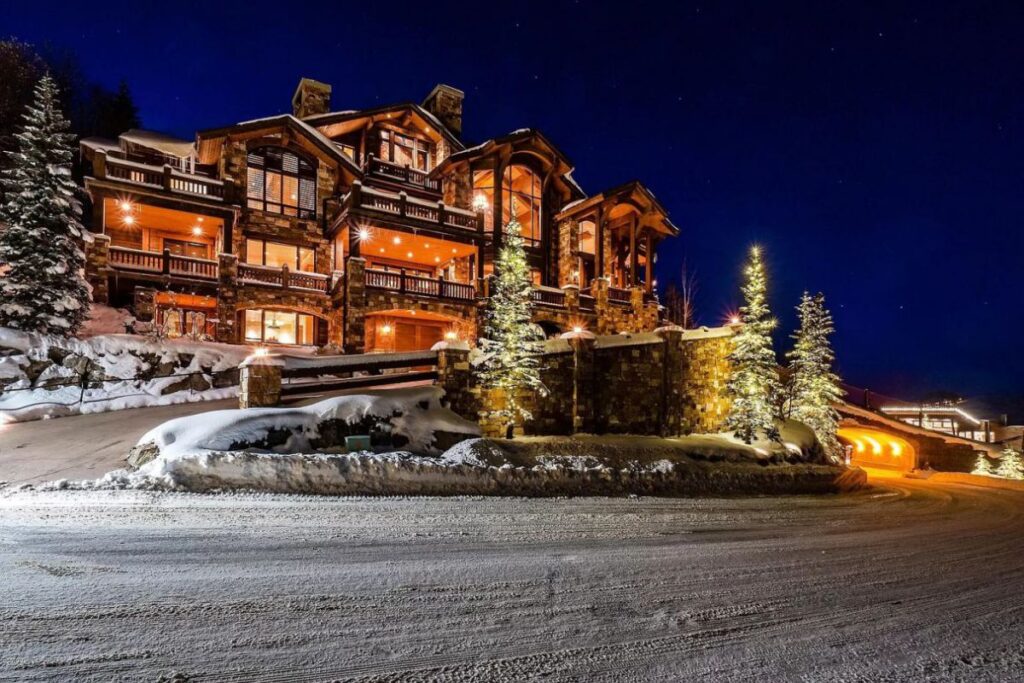 The Utah Property is a luxurious home with old-world craftsmanship and ski lodge comfort now available for sale. This home located at 10663 N Summit View Dr, Heber City, Utah; offering 9 bedrooms and 12 bathrooms with over 12,000 square feet of living spaces.