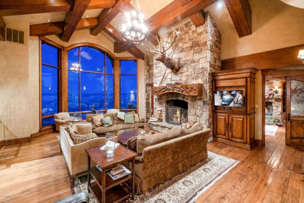 The Utah Property is a luxurious home with old-world craftsmanship and ski lodge comfort now available for sale. This home located at 10663 N Summit View Dr, Heber City, Utah; offering 9 bedrooms and 12 bathrooms with over 12,000 square feet of living spaces.