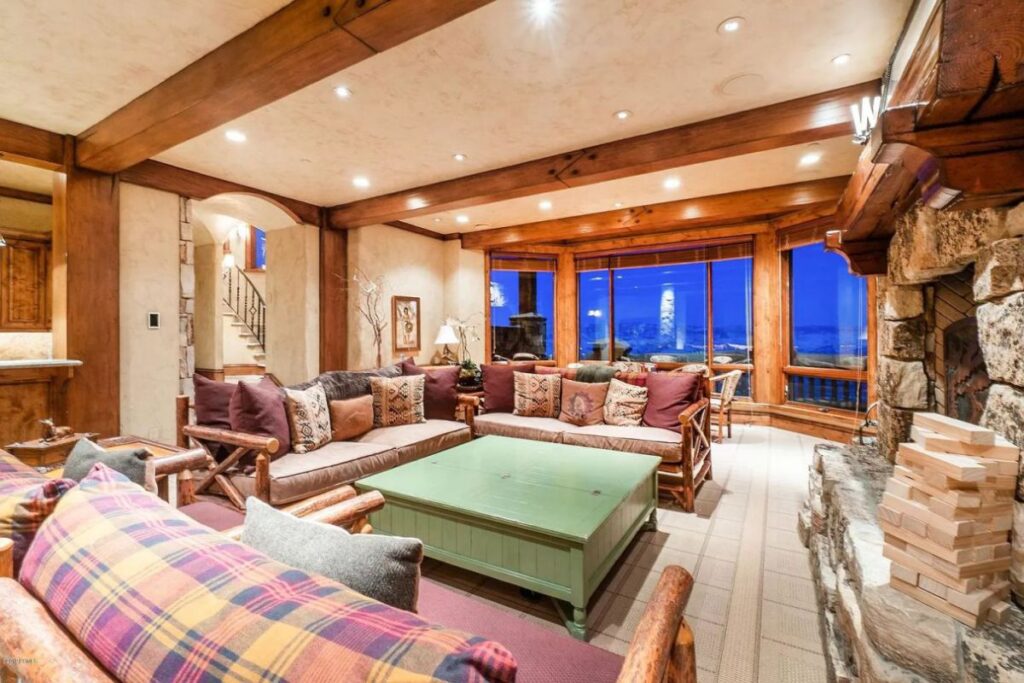 The Utah Property is a luxurious home with old-world craftsmanship and ski lodge comfort now available for sale. This home located at 10663 N Summit View Dr, Heber City, Utah; offering 9 bedrooms and 12 bathrooms with over 12,000 square feet of living spaces.