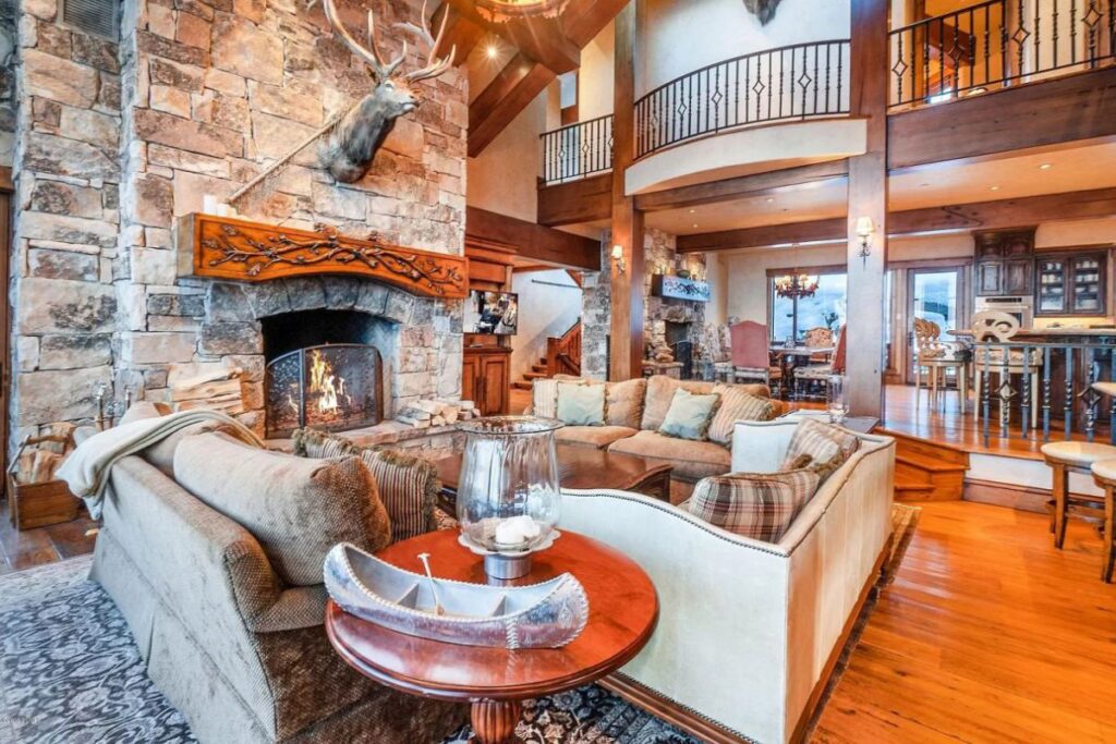The Utah Property is a luxurious home with old-world craftsmanship and ski lodge comfort now available for sale. This home located at 10663 N Summit View Dr, Heber City, Utah; offering 9 bedrooms and 12 bathrooms with over 12,000 square feet of living spaces.