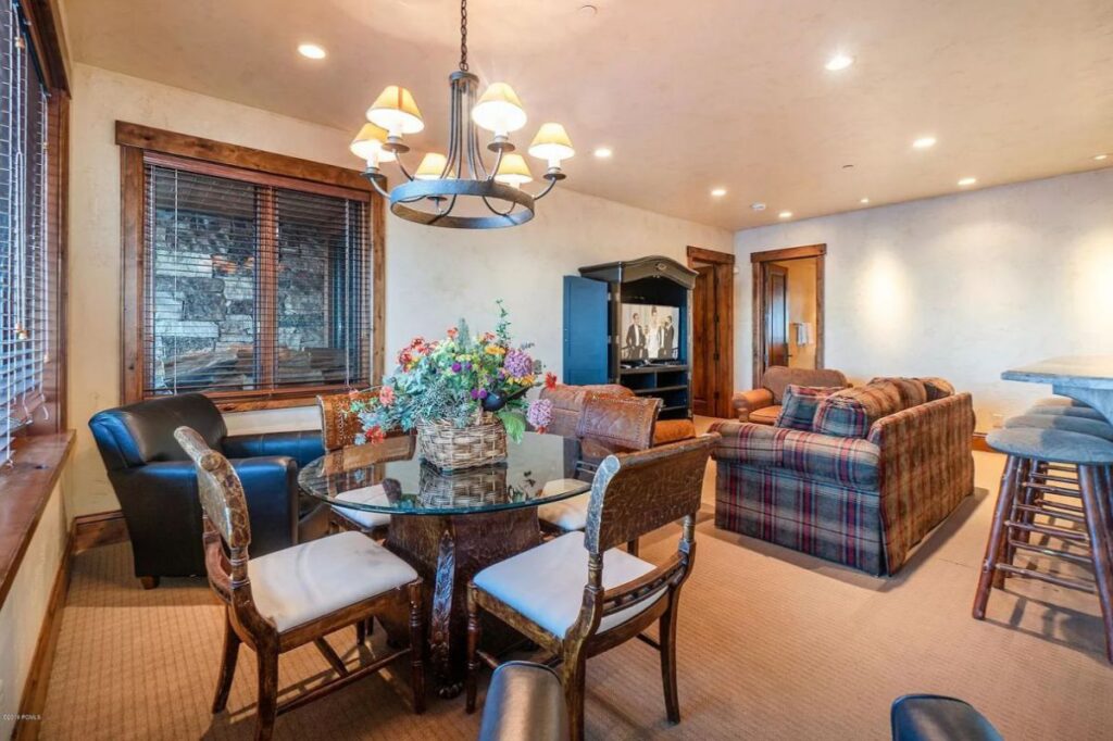 The Utah Property is a luxurious home with old-world craftsmanship and ski lodge comfort now available for sale. This home located at 10663 N Summit View Dr, Heber City, Utah; offering 9 bedrooms and 12 bathrooms with over 12,000 square feet of living spaces.