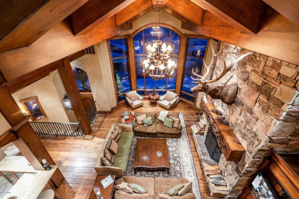 The Utah Property is a luxurious home with old-world craftsmanship and ski lodge comfort now available for sale. This home located at 10663 N Summit View Dr, Heber City, Utah; offering 9 bedrooms and 12 bathrooms with over 12,000 square feet of living spaces.