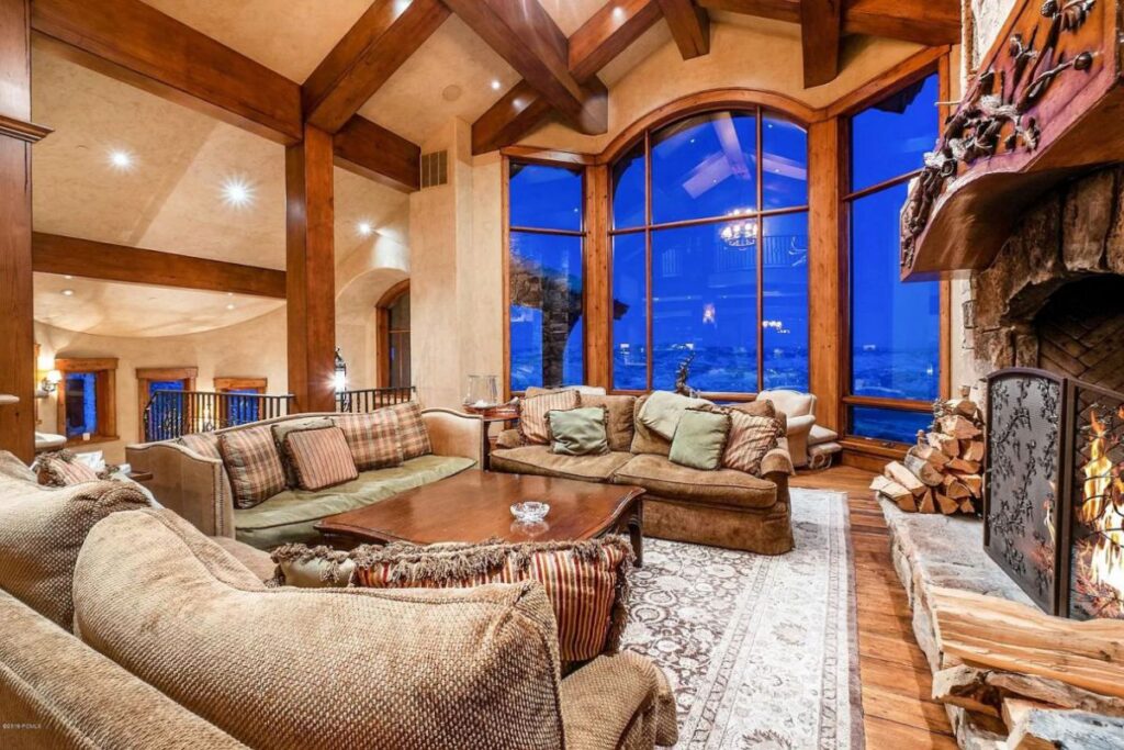 The Utah Property is a luxurious home with old-world craftsmanship and ski lodge comfort now available for sale. This home located at 10663 N Summit View Dr, Heber City, Utah; offering 9 bedrooms and 12 bathrooms with over 12,000 square feet of living spaces.