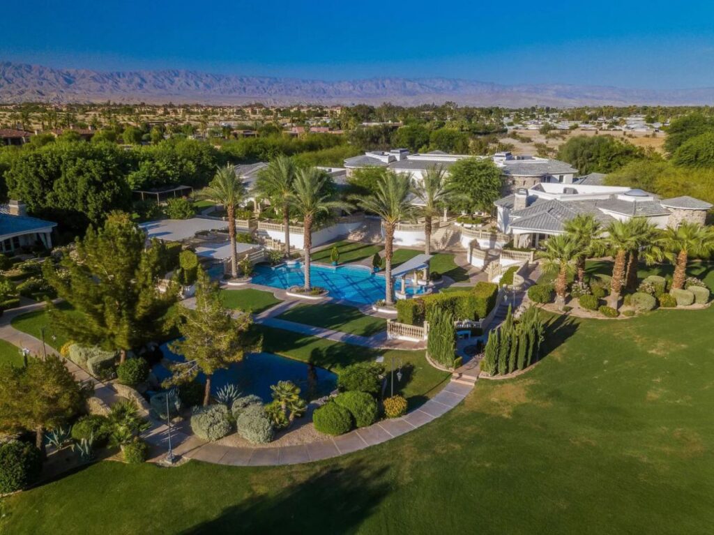 The Rancho Mirage Home is a true family sanctuary with spectacular views of mountains, lake, gardens now available for sale. This home located at 1 St Petersburg Ct, Rancho Mirage, California; offering 7 bedrooms and 9 bathrooms with over 17,800 square feet of living spaces.