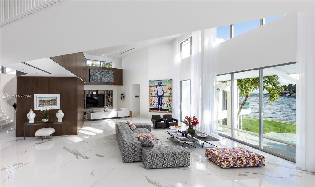 The Florida Mansion is a Completely rebuilt with custom chic modern estate nestled in the guard-gated community now available for sale. This home located at 6946 Sunrise Ct, Coral Gables, Florida; offering 5 bedrooms and 5 bathrooms with over 6,800 square feet of living spaces.