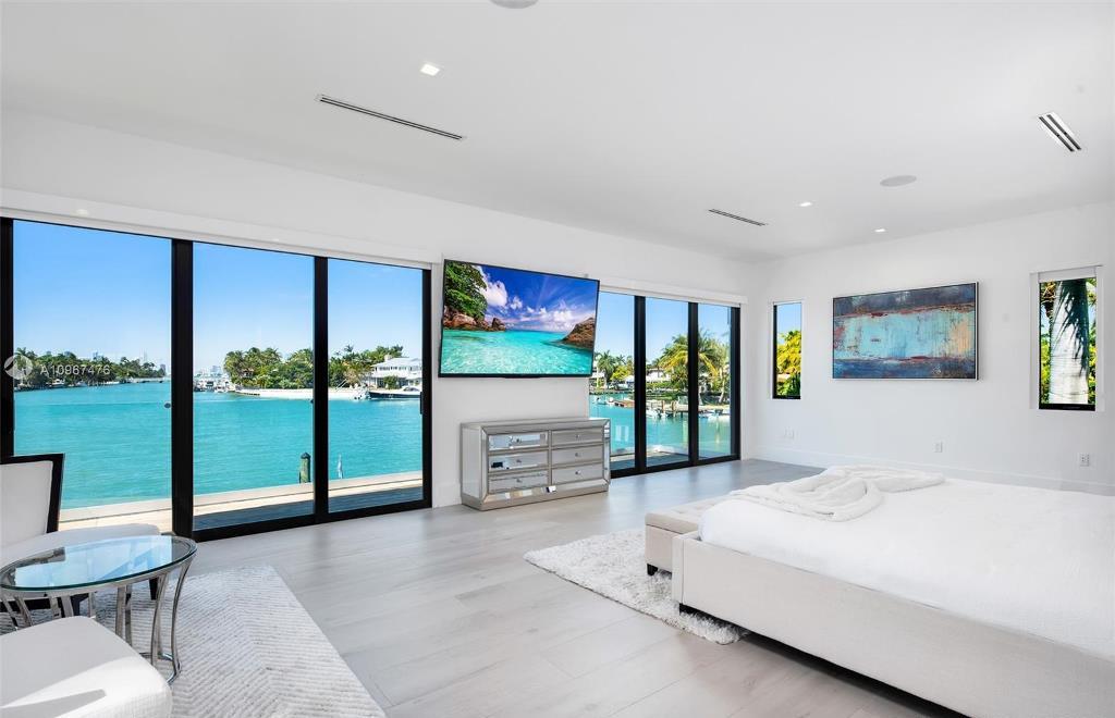 The Miami Beach Waterfront Home is a stunning estate with open water views on the prestigious North Bay Road now available for sale. This home located at 2700 N Bay Rd, Miami Beach, Florida; offering 7 bedrooms and 8 bathrooms with over 10,000 square feet of living spaces.