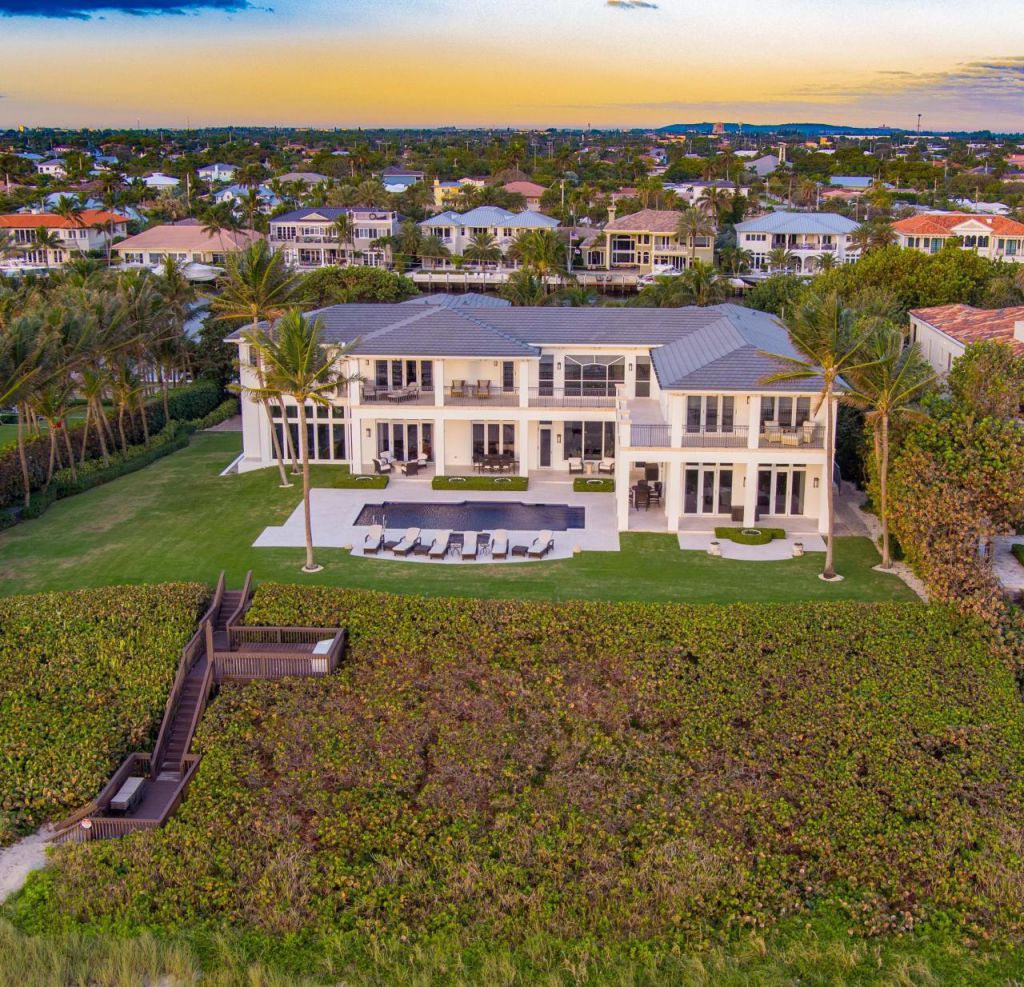 The Florida Mansion is a magnificent ocean-to-intracoastal estate presents as a resort-like paradise in gated privacy now available for sale. This home located at 1007 Hillsboro Mile, Hillsboro Beach, Florida; offering 7 bedrooms and 11 bathrooms with over 11,300 square feet of living spaces.