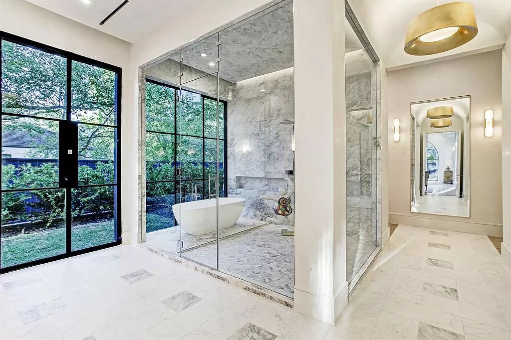 The Houston Home is a an enchanting fusion of French elegance and chic, contemporary vision now available for sale. This home located at 721 Ourlane Cir, Houston, Texas; offering 8 bedrooms and 11 bathrooms with over 12,000 square feet of living spaces.