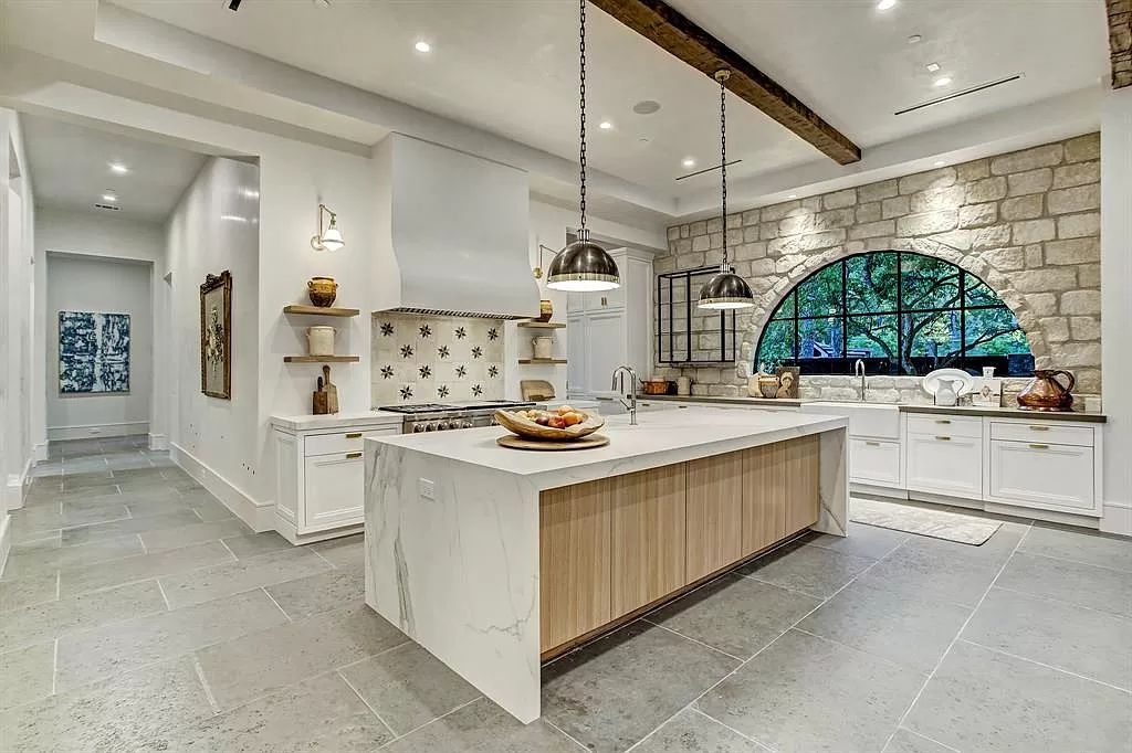 The Houston Home is a an enchanting fusion of French elegance and chic, contemporary vision now available for sale. This home located at 721 Ourlane Cir, Houston, Texas; offering 8 bedrooms and 11 bathrooms with over 12,000 square feet of living spaces.