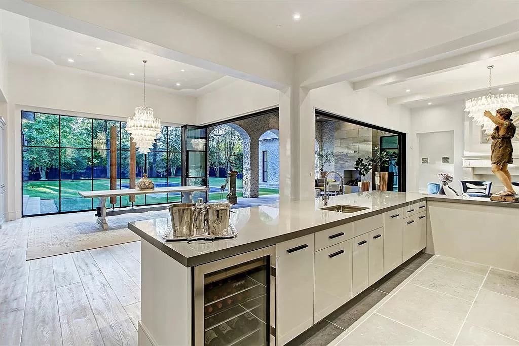 The Houston Home is a an enchanting fusion of French elegance and chic, contemporary vision now available for sale. This home located at 721 Ourlane Cir, Houston, Texas; offering 8 bedrooms and 11 bathrooms with over 12,000 square feet of living spaces.