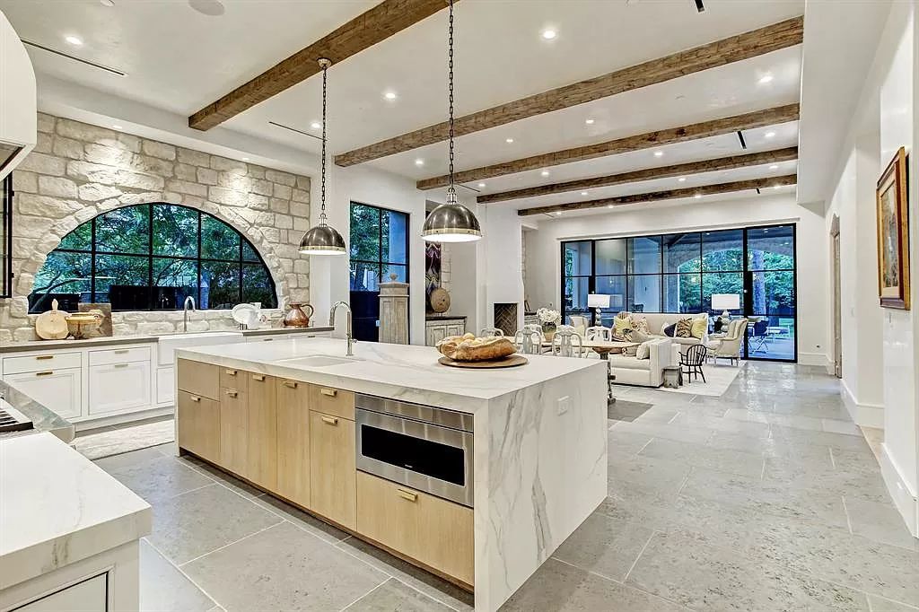 The Houston Home is a an enchanting fusion of French elegance and chic, contemporary vision now available for sale. This home located at 721 Ourlane Cir, Houston, Texas; offering 8 bedrooms and 11 bathrooms with over 12,000 square feet of living spaces.