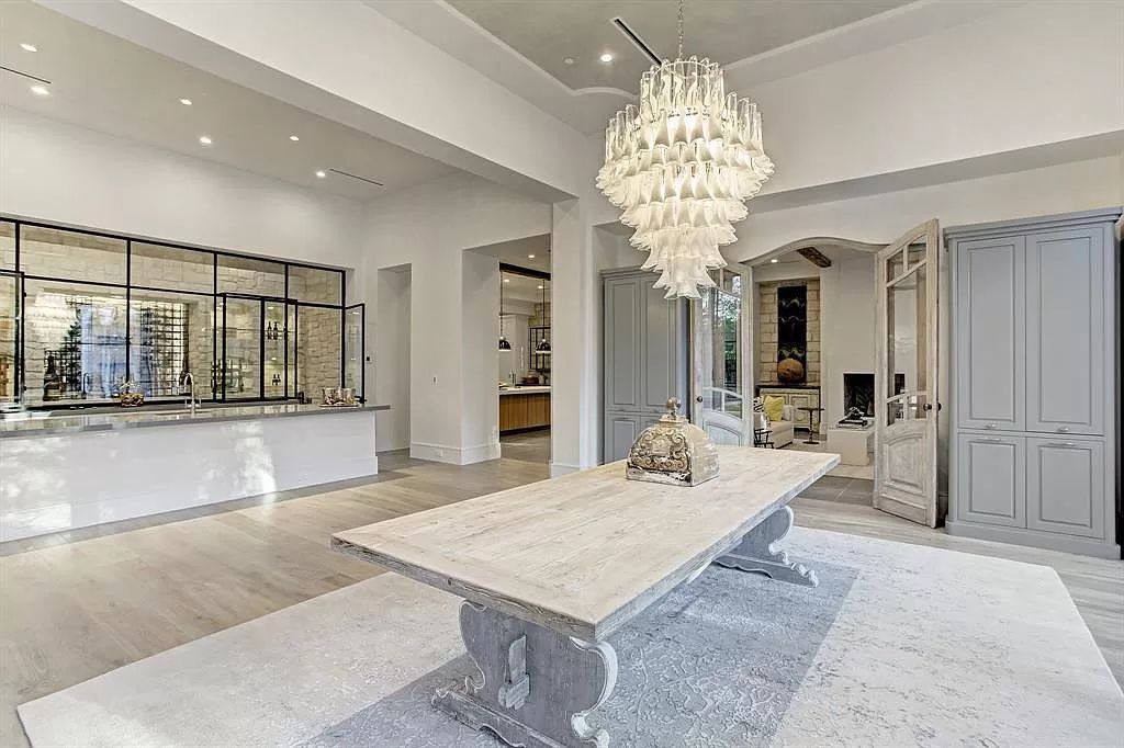 The Houston Home is a an enchanting fusion of French elegance and chic, contemporary vision now available for sale. This home located at 721 Ourlane Cir, Houston, Texas; offering 8 bedrooms and 11 bathrooms with over 12,000 square feet of living spaces.