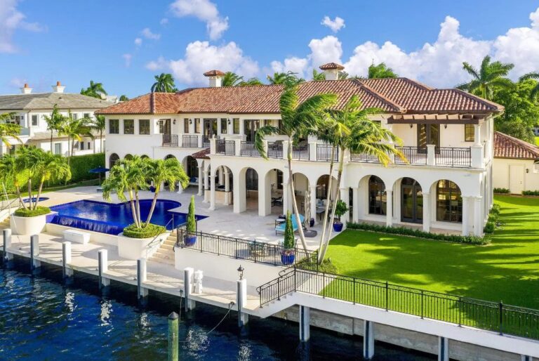 An Impeccable Palm Beach Style Mansion in Boca Raton offering Luxurious Living Spaces Spanning over 10,000 SF