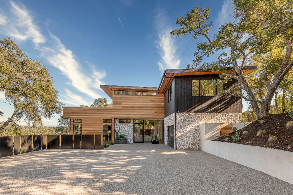 The Home for Sale in Encino is a architectural masterpiece with Exemplary exterior finishes include natural stone, cedar cladding. This home located at 16836 Marmaduke Pl, Encino, California; offering 7 bedrooms and 8 bathrooms with over 9,000 square feet of living spaces