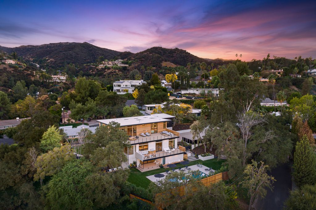 The Home for Sale in Encino is a architectural masterpiece with Exemplary exterior finishes include natural stone, cedar cladding. This home located at 16836 Marmaduke Pl, Encino, California; offering 7 bedrooms and 8 bathrooms with over 9,000 square feet of living spaces