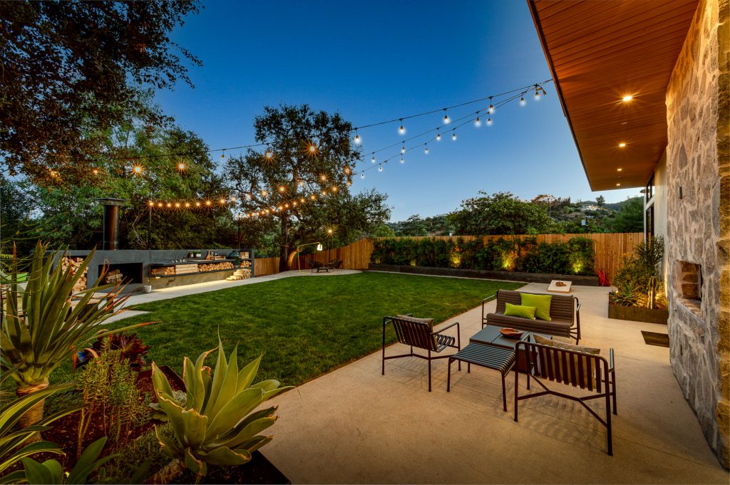 The Home for Sale in Encino is a architectural masterpiece with Exemplary exterior finishes include natural stone, cedar cladding. This home located at 16836 Marmaduke Pl, Encino, California; offering 7 bedrooms and 8 bathrooms with over 9,000 square feet of living spaces