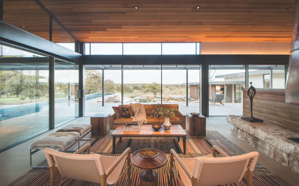 The River Ranch House in Texas was designed by Jobe Corral Architects in contemporary style is composed of beautiful oak trees, open views, and a slice of the river. This home located on beautiful lot with amazing views and wonderful outdoor living spaces including patio, pool, garden.