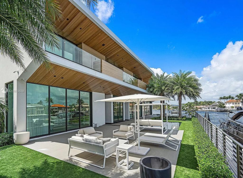 The Boca Raton Mansion is a spectacular contemporary residence on an oversized Intracoastal Waterway lot now available for sale. This home located at 819 Orchid Dr, Boca Raton, Florida; offering 9 bedrooms and 14 bathrooms with over 12,600 square feet of living spaces.