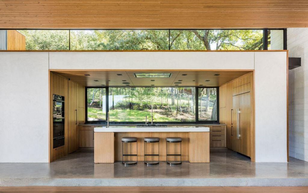 This Contemporary House in Austin, Texas, was designed by Ravel Architecture for clients in search of a quiet and private sanctuary; this house offers elegant living with fine finishes and smart amenities.