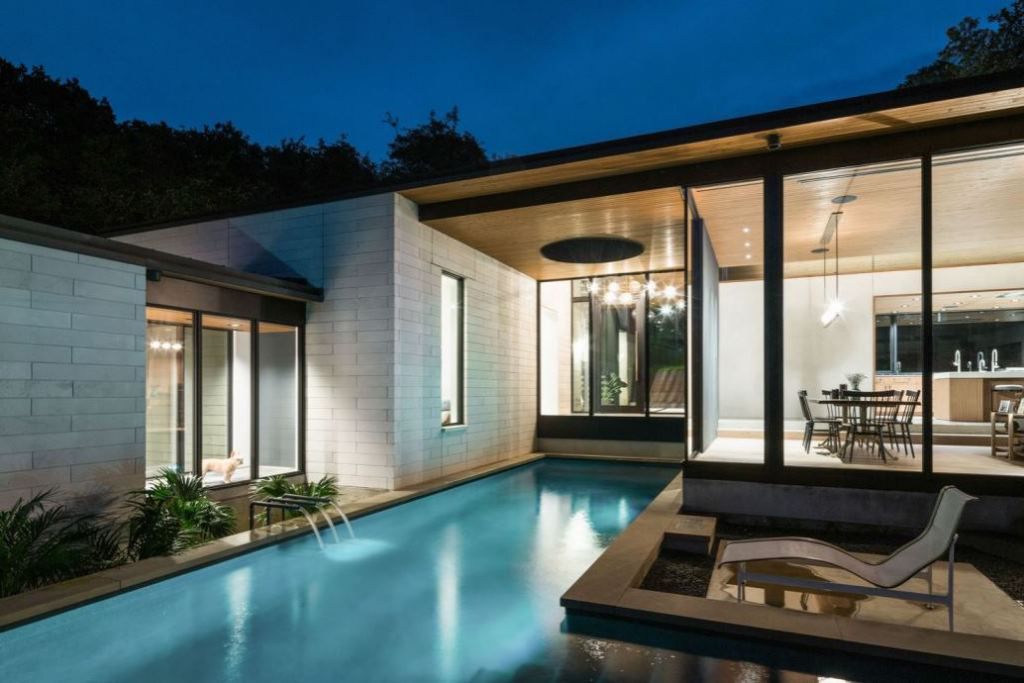 This Contemporary House in Austin, Texas, was designed by Ravel Architecture for clients in search of a quiet and private sanctuary; this house offers elegant living with fine finishes and smart amenities.