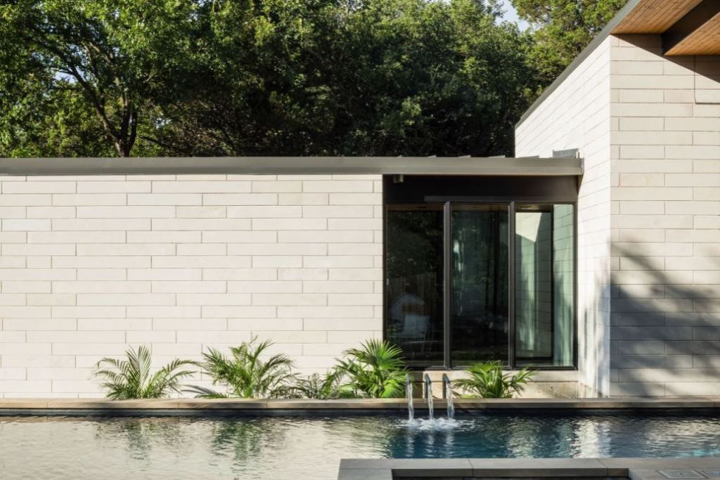 This Contemporary House in Austin, Texas, was designed by Ravel Architecture for clients in search of a quiet and private sanctuary; this house offers elegant living with fine finishes and smart amenities.