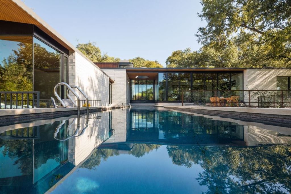 This Contemporary House in Austin, Texas, was designed by Ravel Architecture for clients in search of a quiet and private sanctuary; this house offers elegant living with fine finishes and smart amenities.