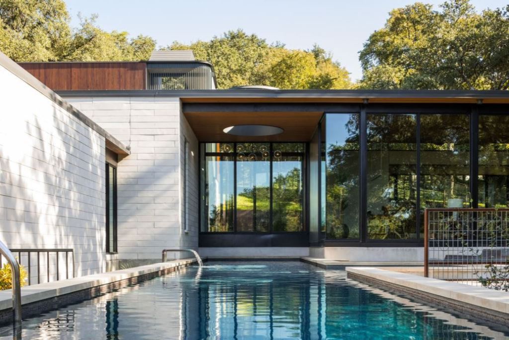 This Contemporary House in Austin, Texas, was designed by Ravel Architecture for clients in search of a quiet and private sanctuary; this house offers elegant living with fine finishes and smart amenities.