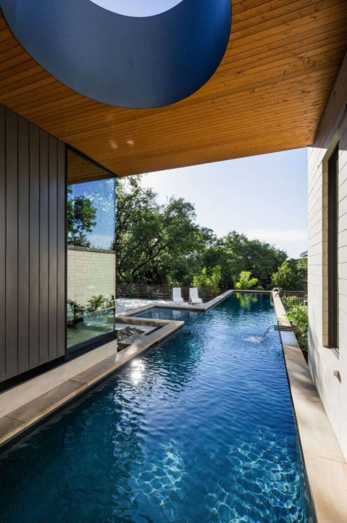 This Contemporary House in Austin, Texas, was designed by Ravel Architecture for clients in search of a quiet and private sanctuary; this house offers elegant living with fine finishes and smart amenities.