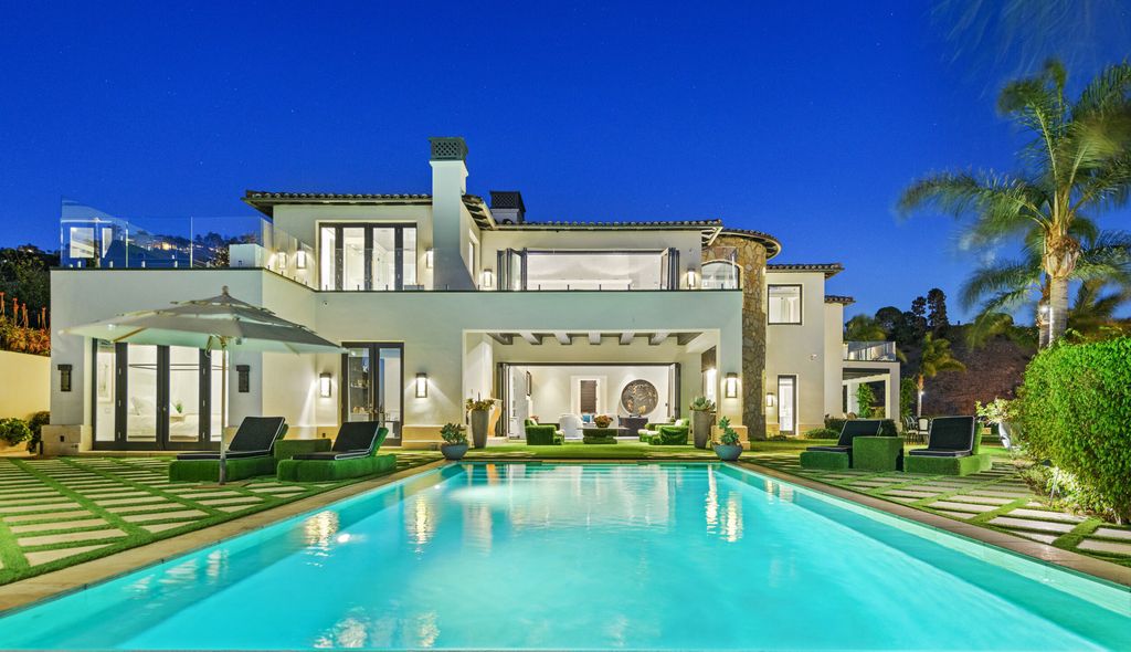 The Malibu Mansion is a private knoll top estate with exquisite finishes, superb quality, expansive views and lavish amenities now available for sale. This home located at 3905 Carbon Canyon Rd, Malibu, California; offering 6 bedrooms and 9 bathrooms with over 11,600 square feet of living spaces.