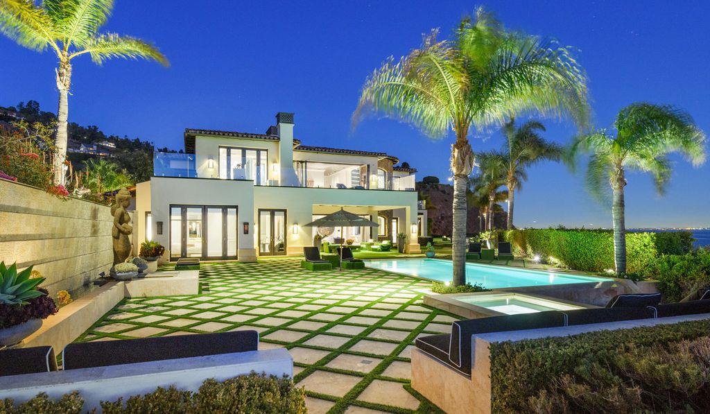 The Malibu Mansion is a private knoll top estate with exquisite finishes, superb quality, expansive views and lavish amenities now available for sale. This home located at 3905 Carbon Canyon Rd, Malibu, California; offering 6 bedrooms and 9 bathrooms with over 11,600 square feet of living spaces.