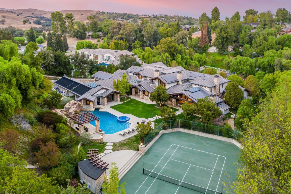 The Hidden Hills Mansion is an architectural masterpiece in the contemporary craftsman style with natural rustic elements now available for sale. This home located at 5824 Jed Smith Rd, Hidden Hills, California; offering 6 bedrooms and 11 bathrooms with over 18,100 square feet of living spaces.