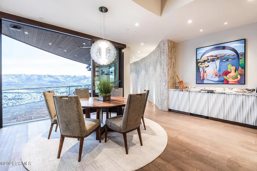 The Park City Home is a marvelous and magnificent estate now available for sale. This home located at 8742 N Lookout Ln, Park City, Utah; offering 6 bedrooms and 9 bathrooms with over 10,000 square feet of living spaces.