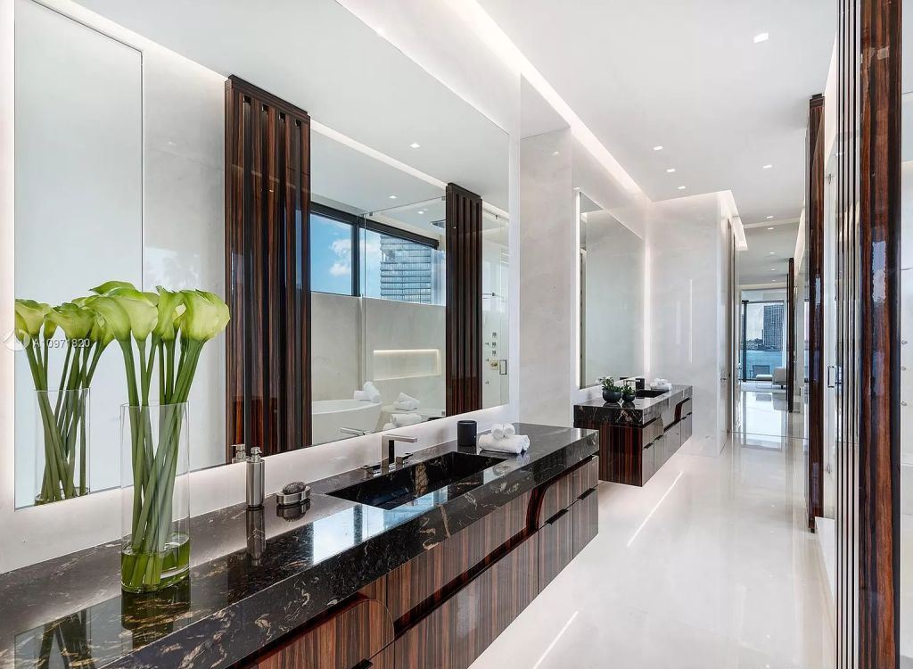The Waterfront Home in Florida is a brand new contemporary residence featuring bespoke architectural details now available for sale. This home located at 18530 N Bay Rd, Sunny Isles Beach, Florida; offering 6 bedrooms and 9 bathrooms with over 3,500 square feet of living spaces.