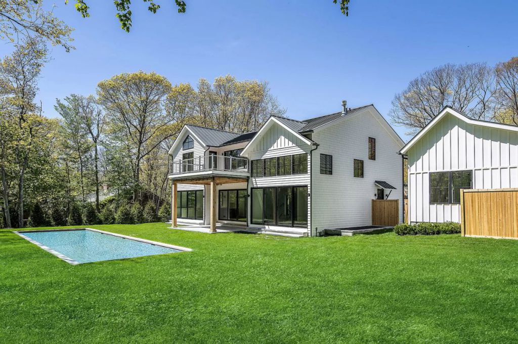 The East Hampton House is a newly constructed modern farmhouse on a prime half-acre parcel both aesthetically and functionally now available for sale. This home located at 51 Wireless Rd, East Hampton, New York; offering 6 bedrooms and 7 bathrooms with over 5,600 square feet of living spaces.