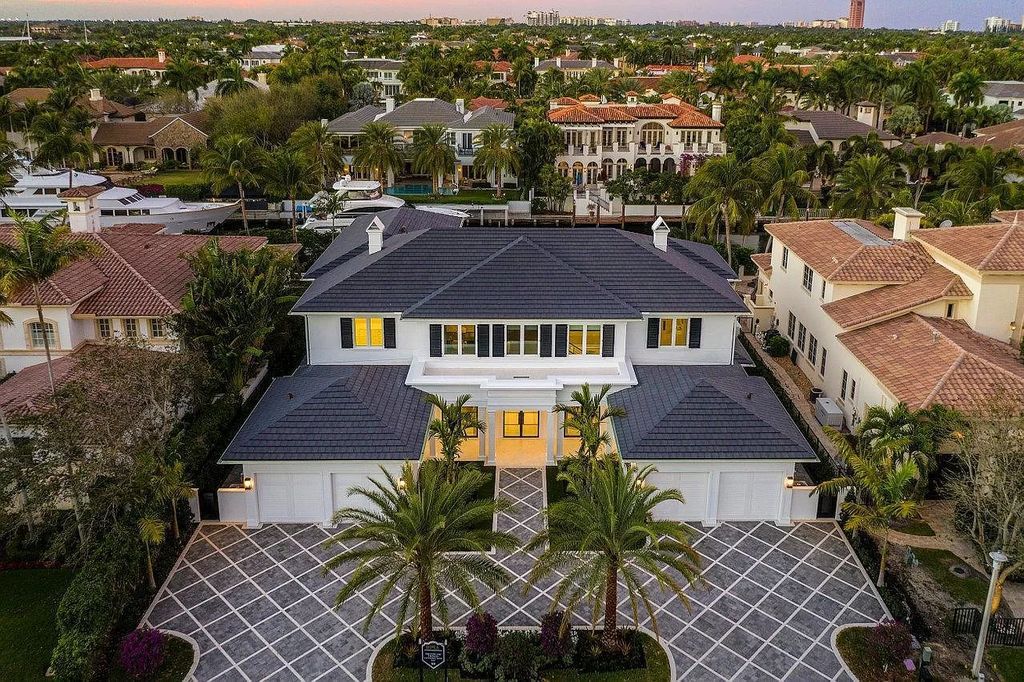 The Boca Raton Home is a band new construction-turnkey modern + traditional home in by the world-renowned Royal Palm Yacht now available for sale. This home located at 225 W Alexander Palm Rd, Boca Raton, Florida; offering 5 bedrooms and 7 bathrooms with over 7,400 square feet of living spaces.
