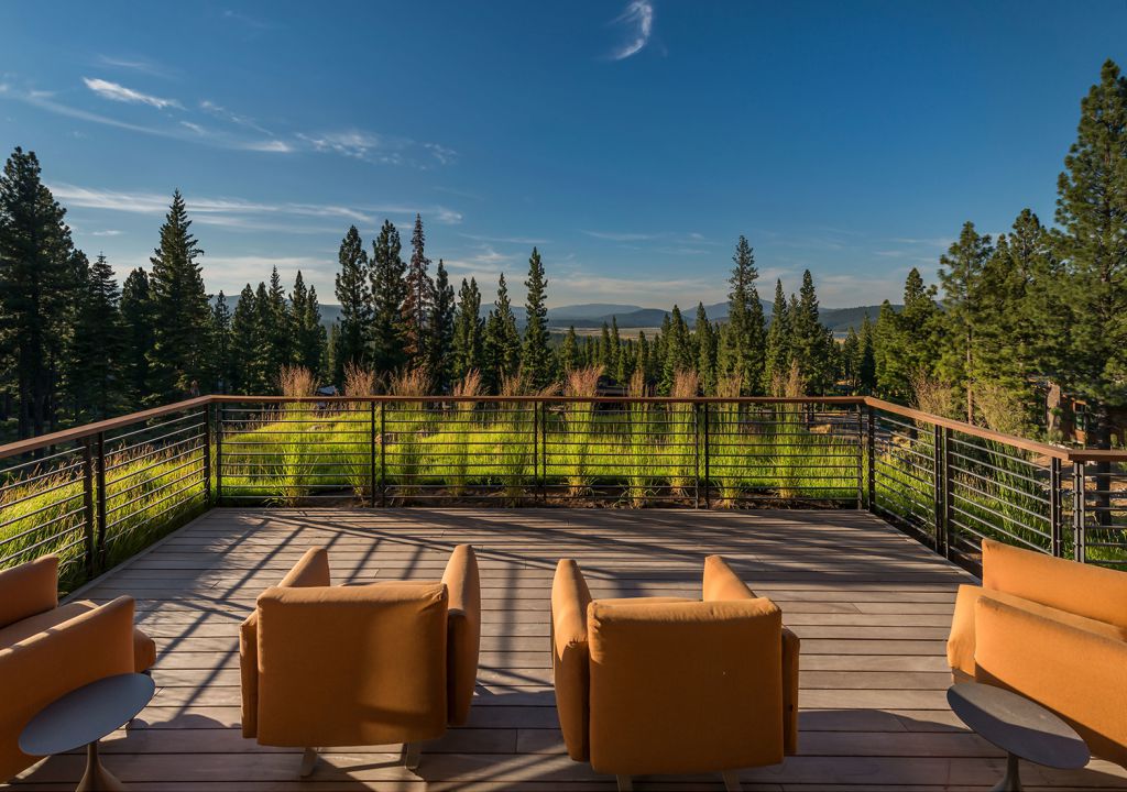 The Martis Camp House on Lot 595 in Truckee, California was designed by Walton Architecture + Engineering in contemporary mountain style; this house offers luxurious retreat with cozy finishes and smart amenities. This home located on beautiful lot with amazing mountain views and wonderful outdoor living spaces including patio, pool, garden.
