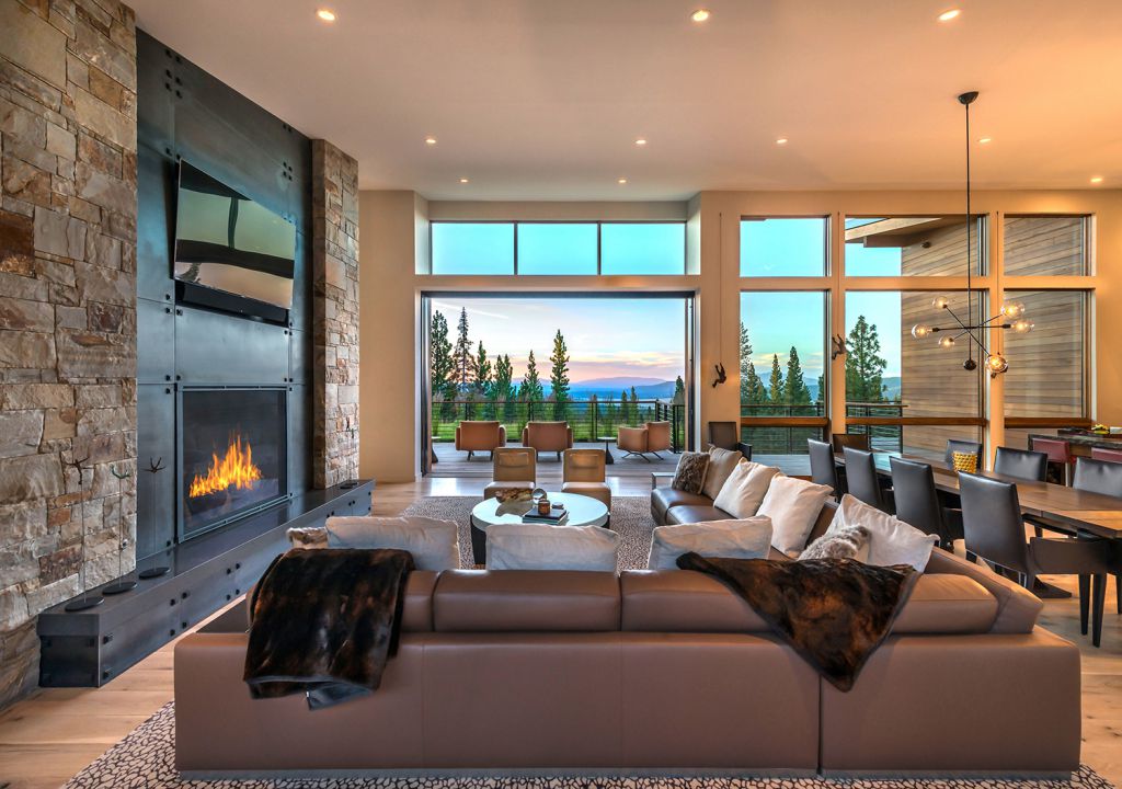 The Martis Camp House on Lot 595 in Truckee, California was designed by Walton Architecture + Engineering in contemporary mountain style; this house offers luxurious retreat with cozy finishes and smart amenities. This home located on beautiful lot with amazing mountain views and wonderful outdoor living spaces including patio, pool, garden.